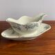 Iron earth gravy boat