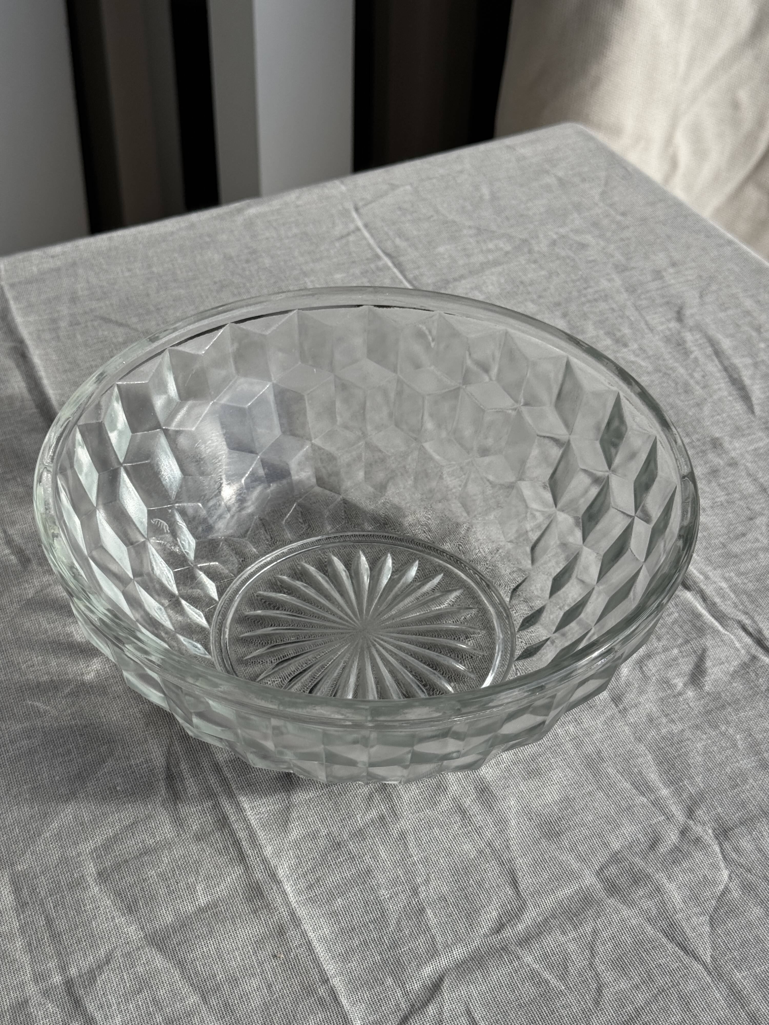 Small vintage glass bowl with a cube pattern.