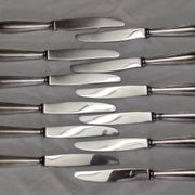set of 12 Christofle table knives model "pearls" in silver metal from the 60s