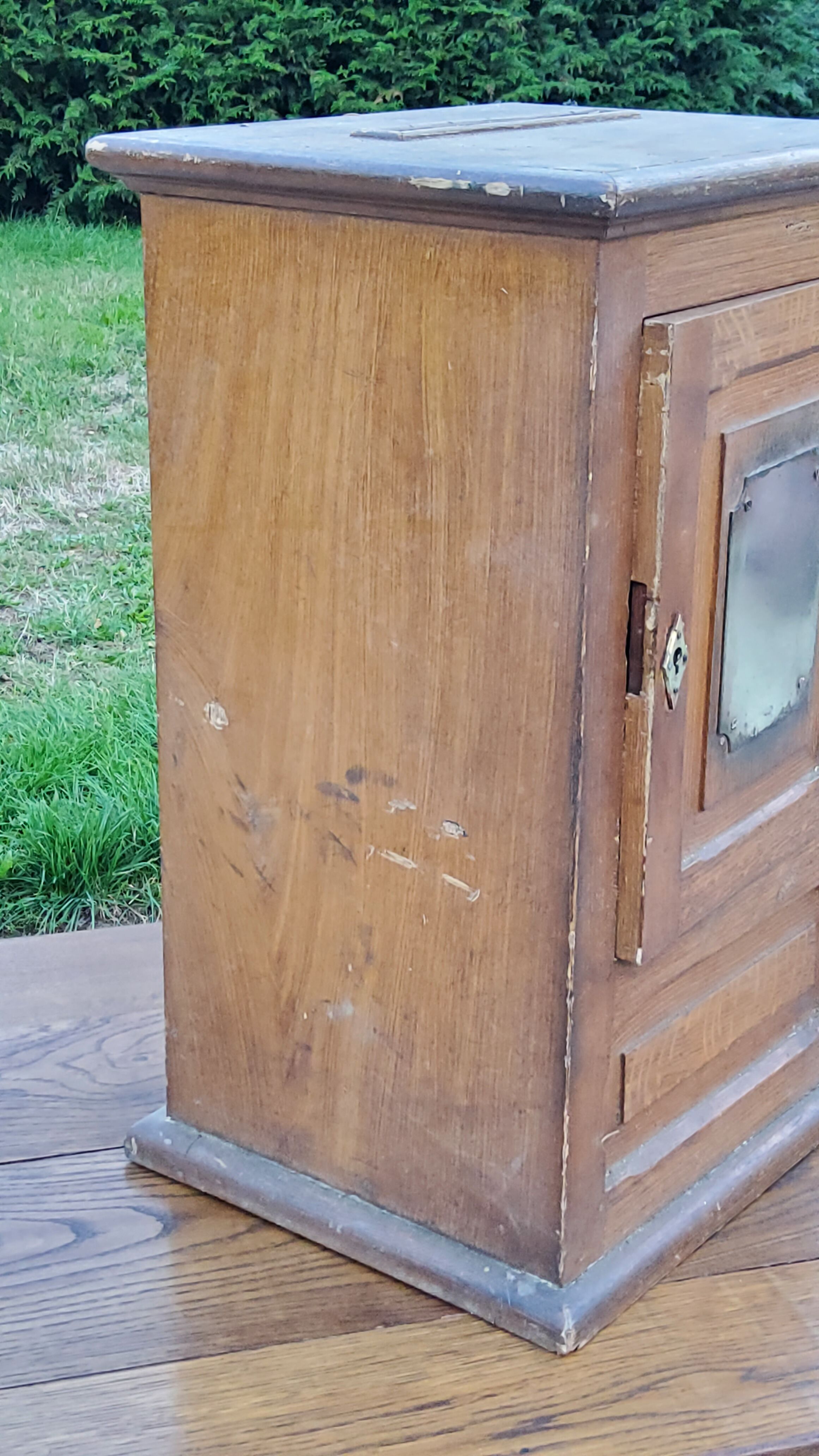 Old oak and brass mailbox