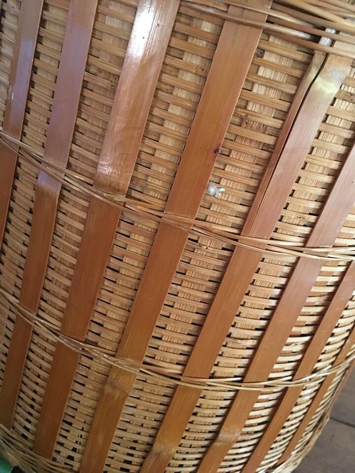 Two pot covers in Wicker, rope and wood.