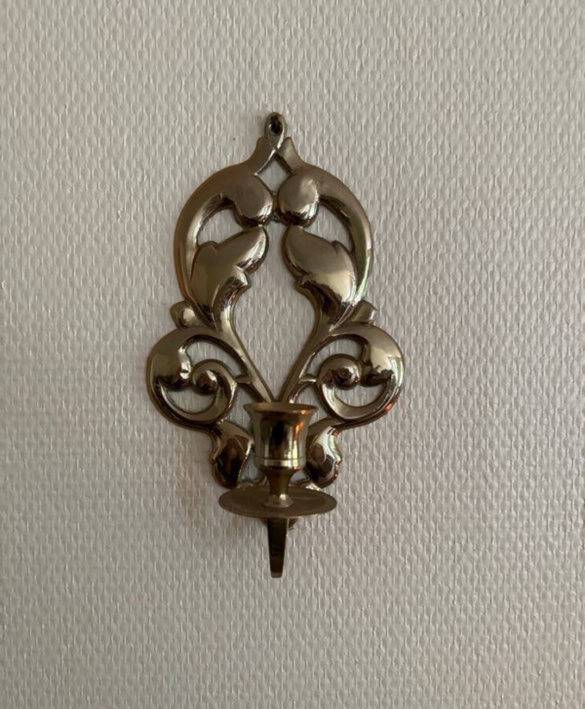 Antique brass wall candle holder