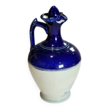 Antique iron-rich earth bottle from Saint Uze, ceramic carafe jug.