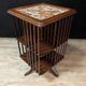 Rotating walnut library with a marble top.