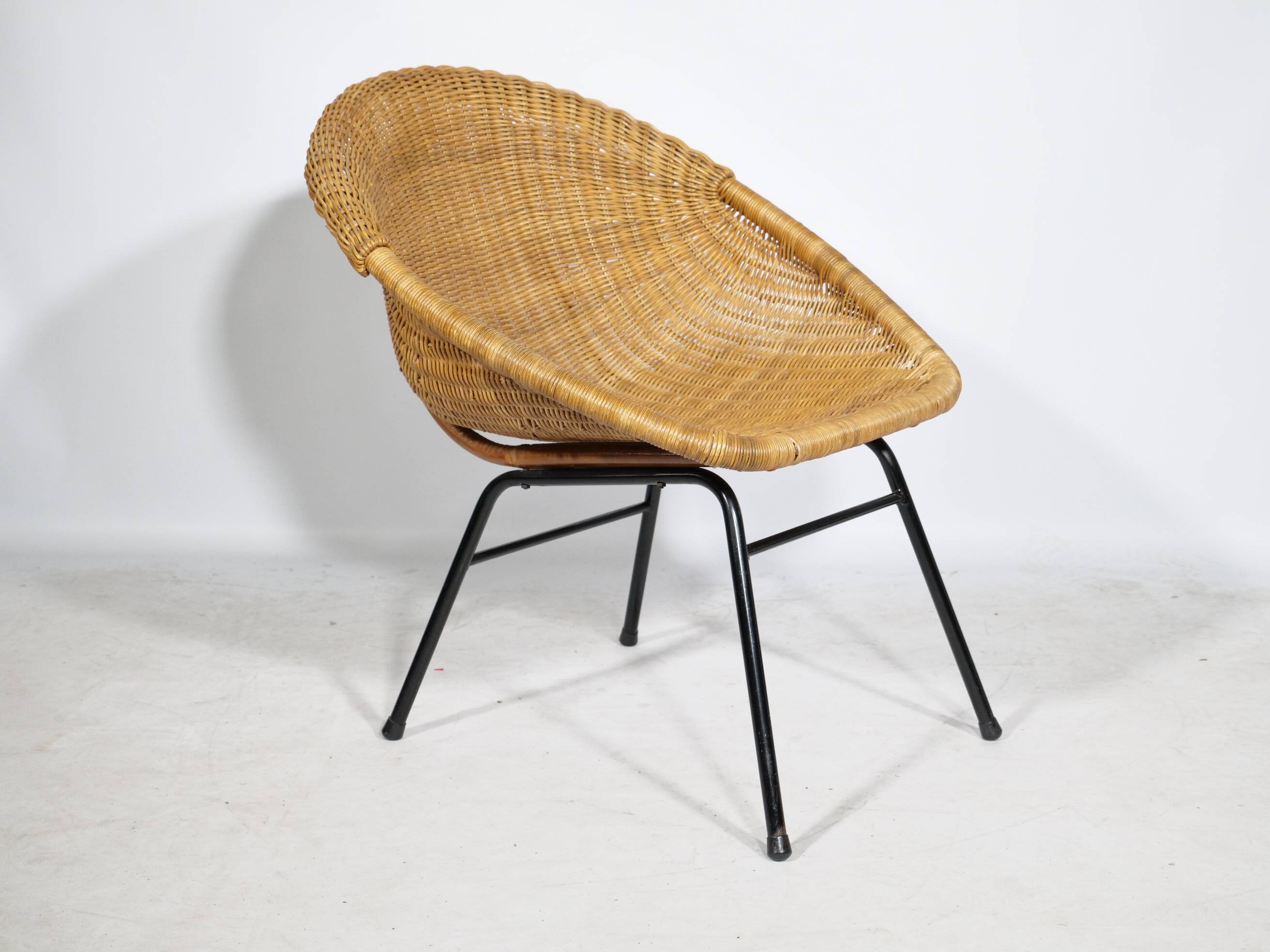 Woven rattan armchair from the 1960s