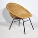 Woven rattan armchair from the 1960s