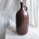 Large burgundy jar