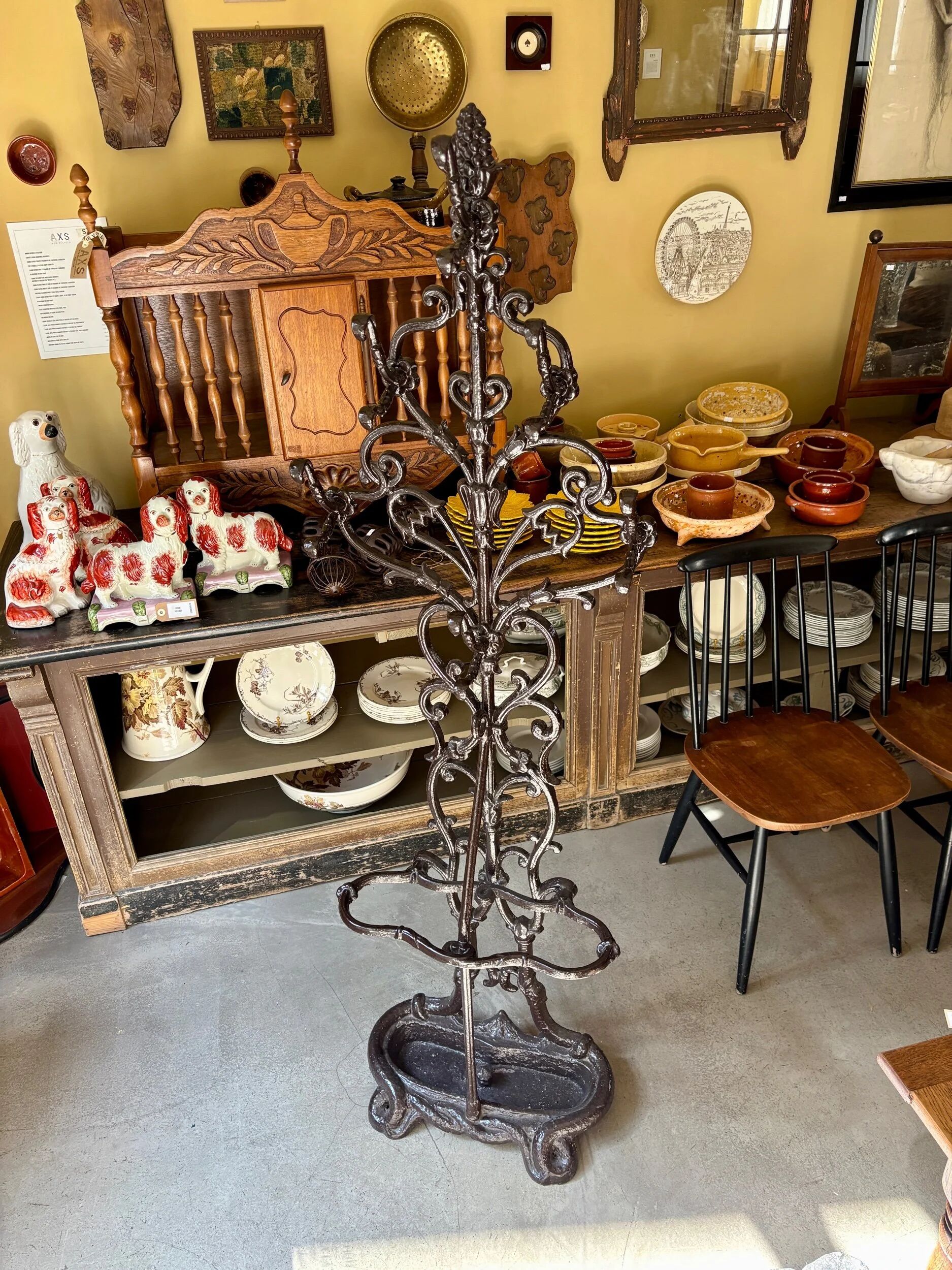 Coat rack with 6 hooks and cast iron brown umbrella stand.