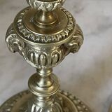 Pair of gilt bronze ram's head candlesticks, Louis XVI style, 19th century.