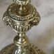 Paire de bougeoirs tête de béliers en bronze doré, style Louis XVI, XIXème