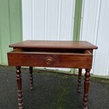 Wooden side table with turned legs