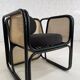 Cubic armchair in black rattan and canework