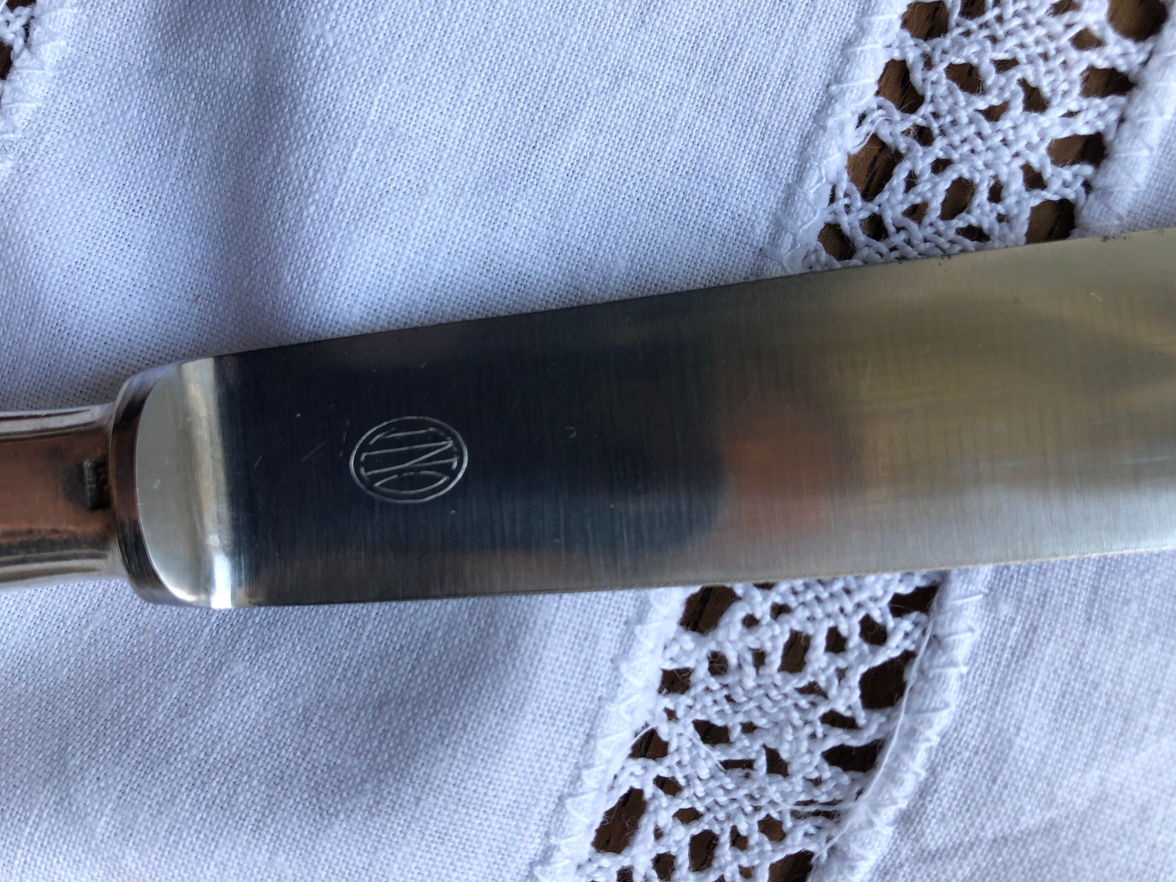 Série de 10 couteaux de table ercuis métal argenté