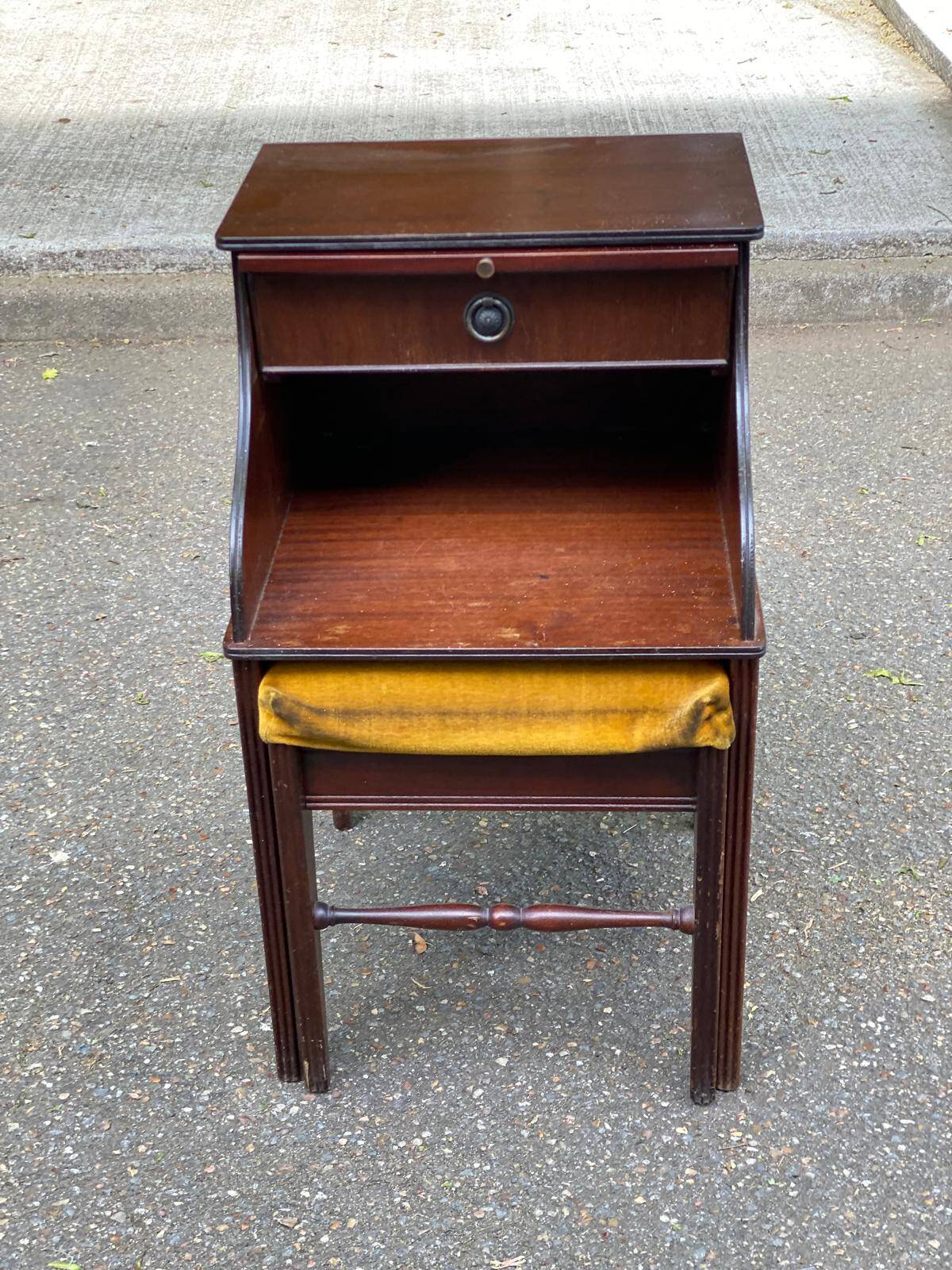 Mahogany bedside table in English style with stool.