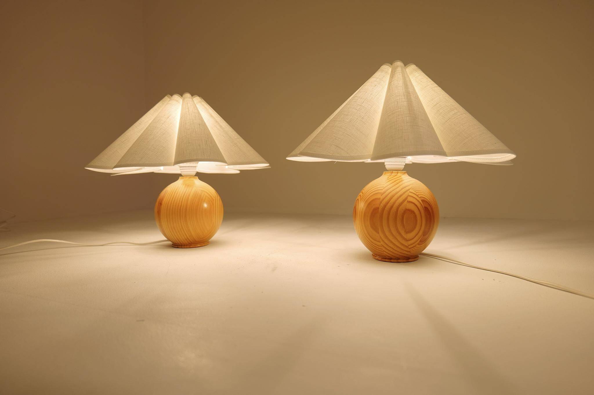 Sculptural modern table lamps from the mid-century in solid pine, Sweden, 1970s.