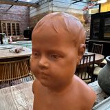 Child bust in terracotta