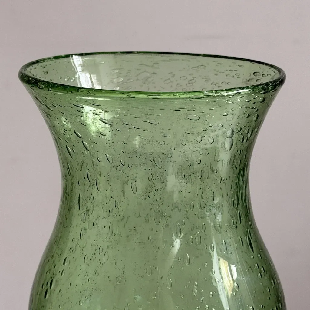 Green blown glass photophore from the Biot glassworks, height 22 cm.
