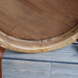 Table basse art déco de forme ronde en palissandre de rio.