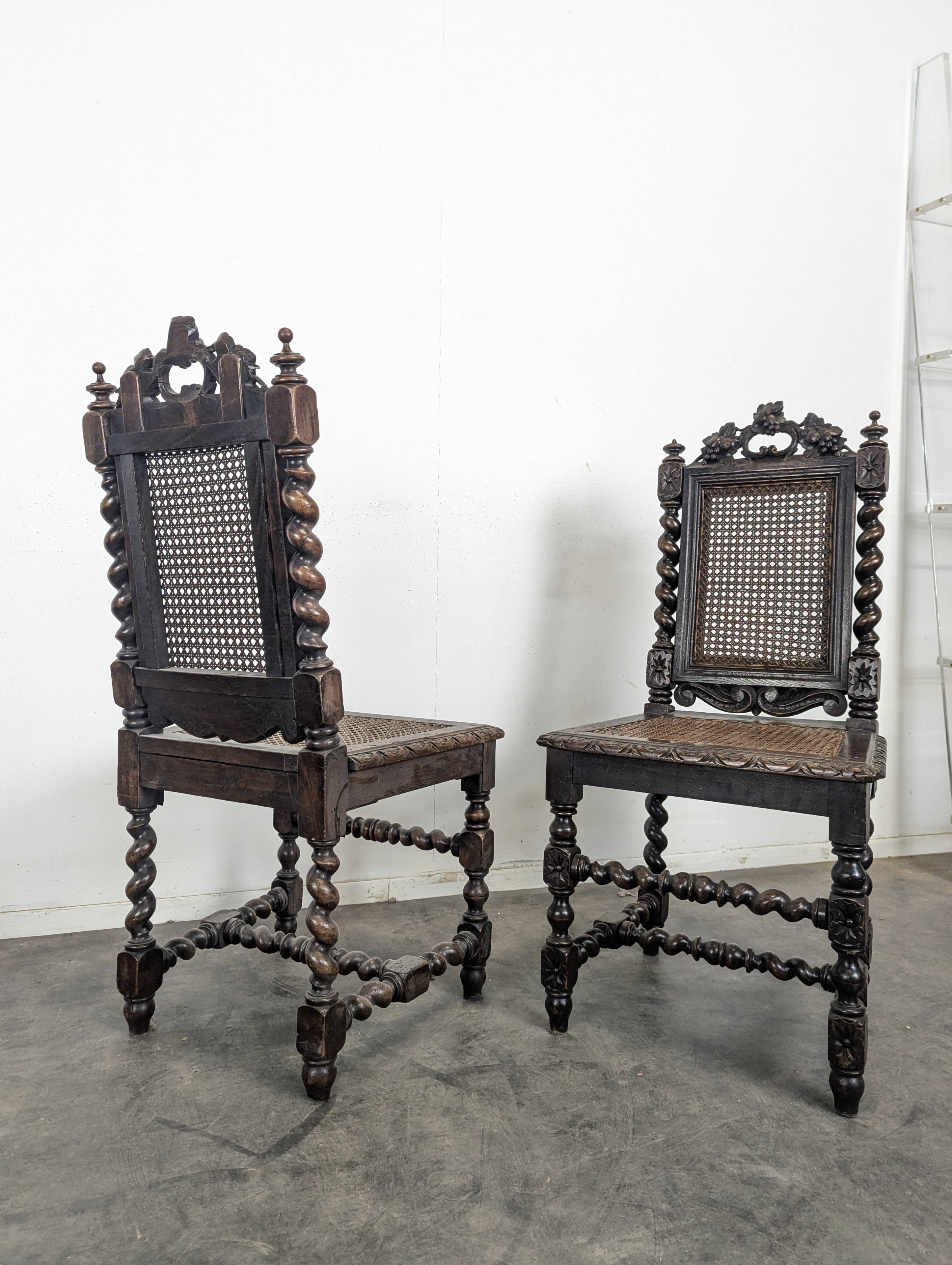 Pair of Louis XIII chairs in twisted oak with caning.