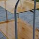 Folding dessert trolley on chrome metal wheels and formica.