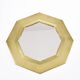 Old golden octagonal mirror, in brass
