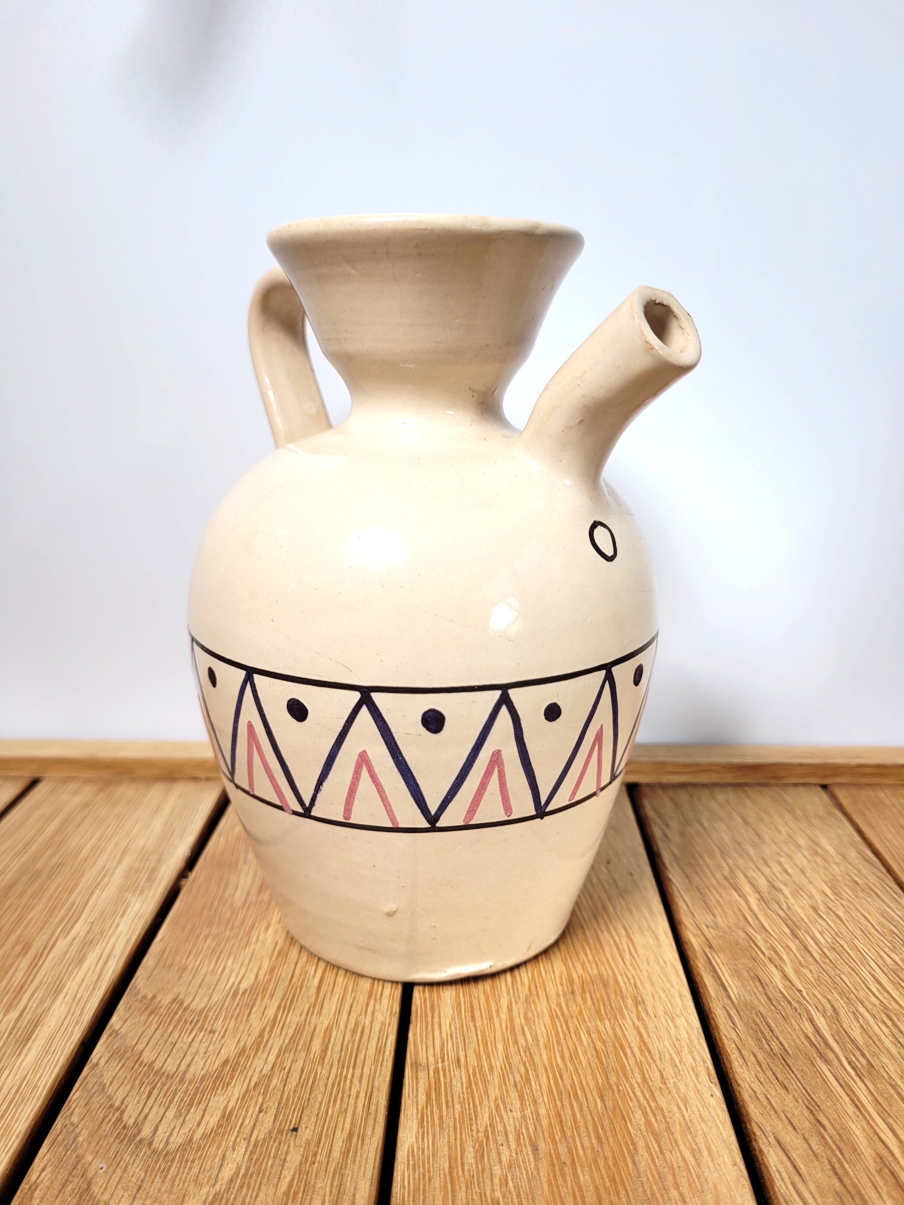 Ceramic pitcher decorated pottery