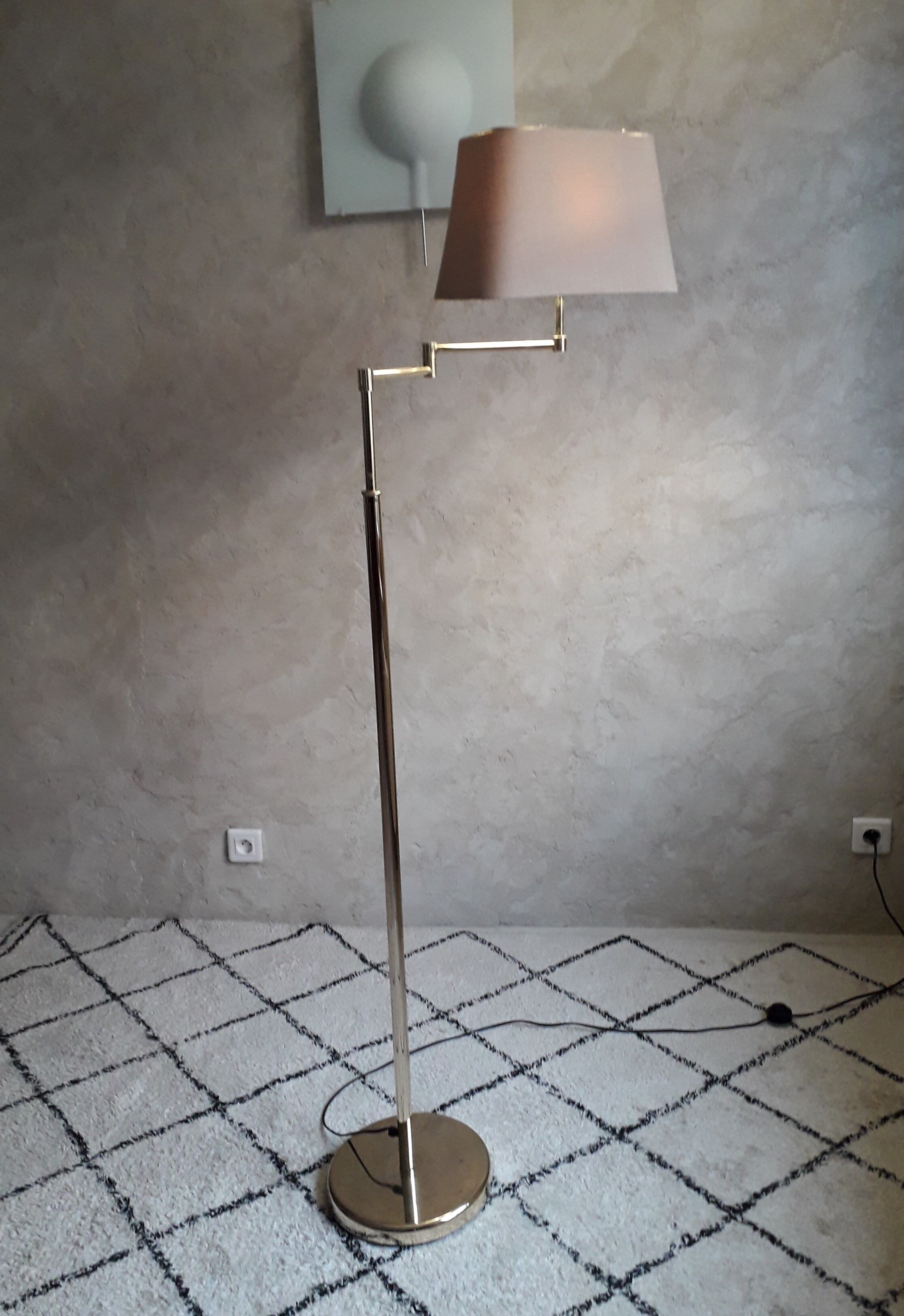 Brass articulated floor lamp