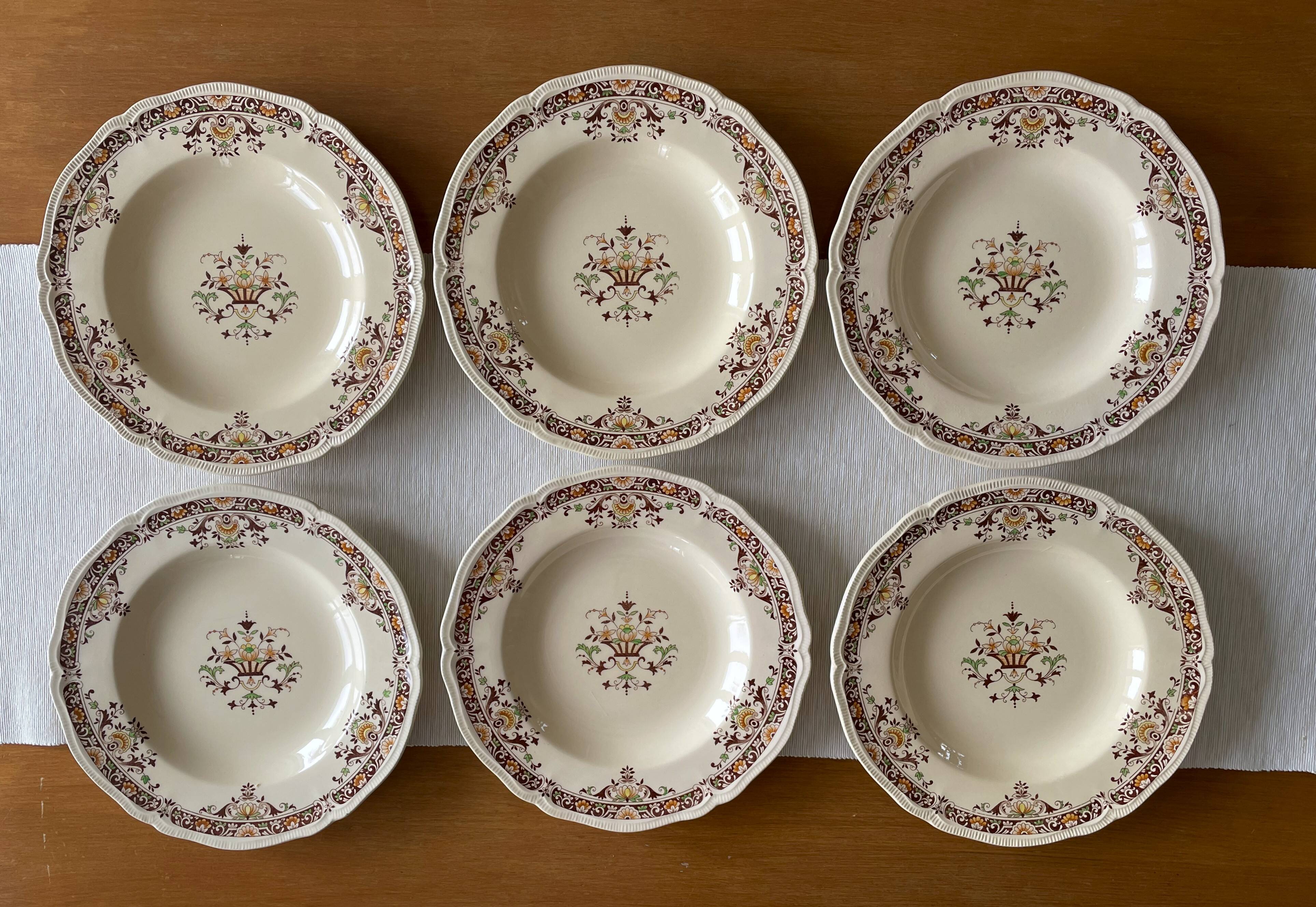 6 antique semi-deep plates in Longchamp earthenware.
