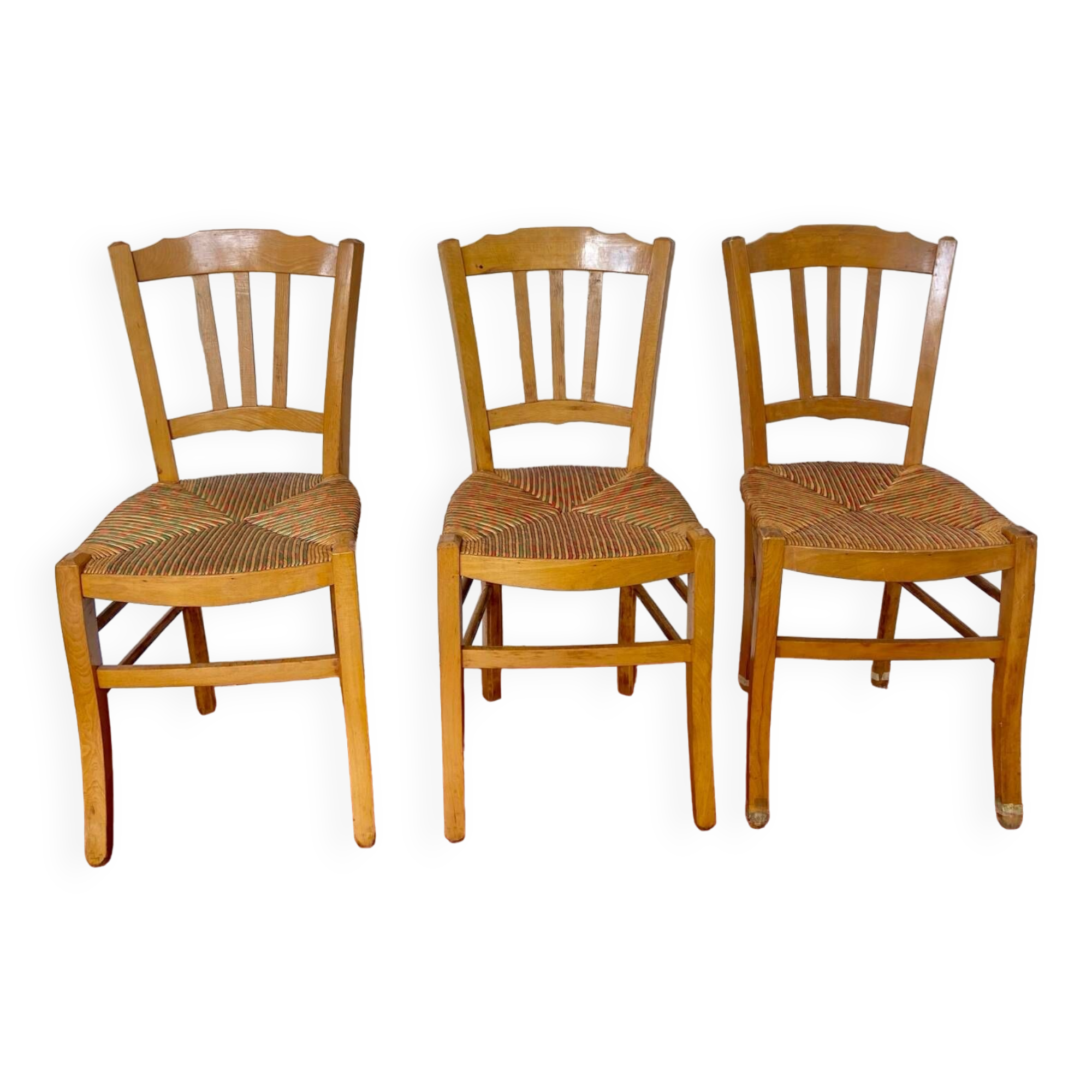 Trio of vintage straw/colored chairs
