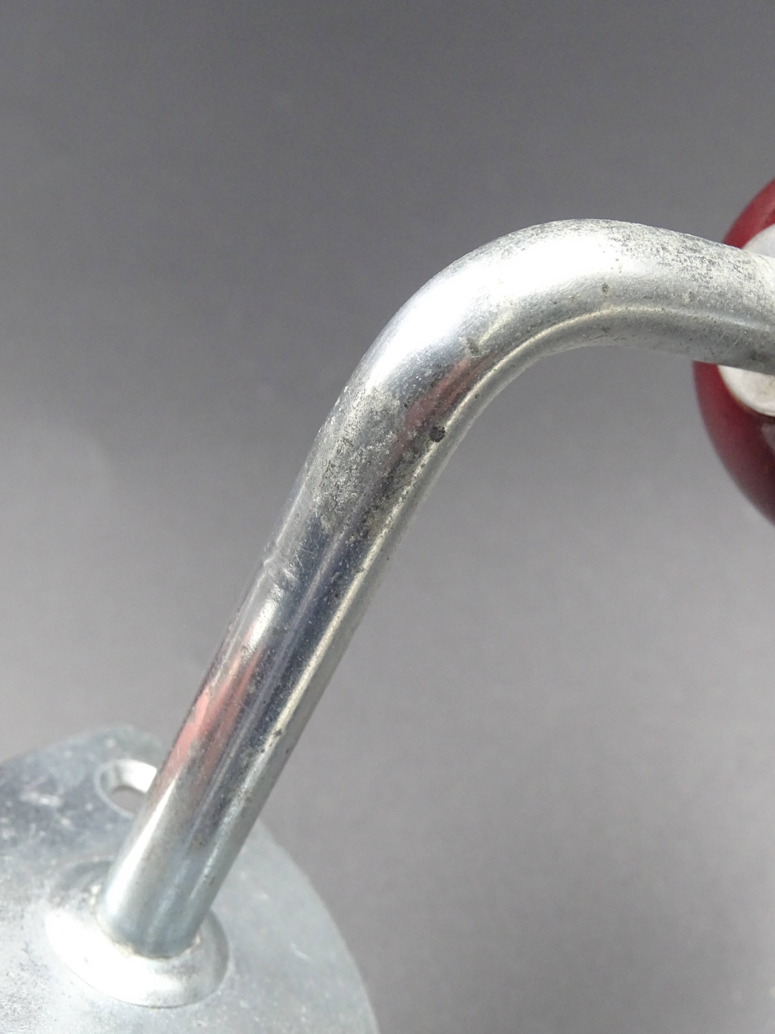 Two hooks in red bakelite and metal - around 1950