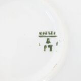 A yellow Art Deco ceramic tobacco service decorated with thistles from the 1920s to 1930s.