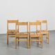 Suite of four chairs in the style of Maison Regain
