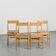 Suite of four chairs in the style of Maison Regain