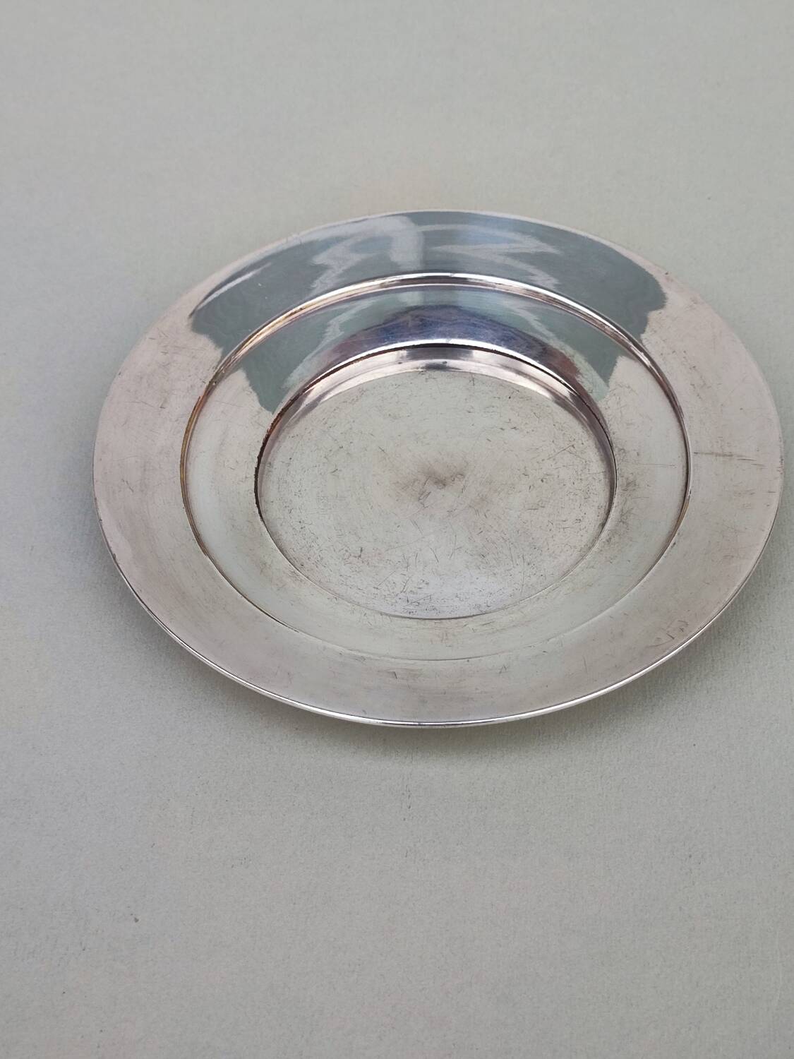 Trois sous-verres en métal argenté