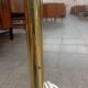 Vintage floor lamp with a gold base.