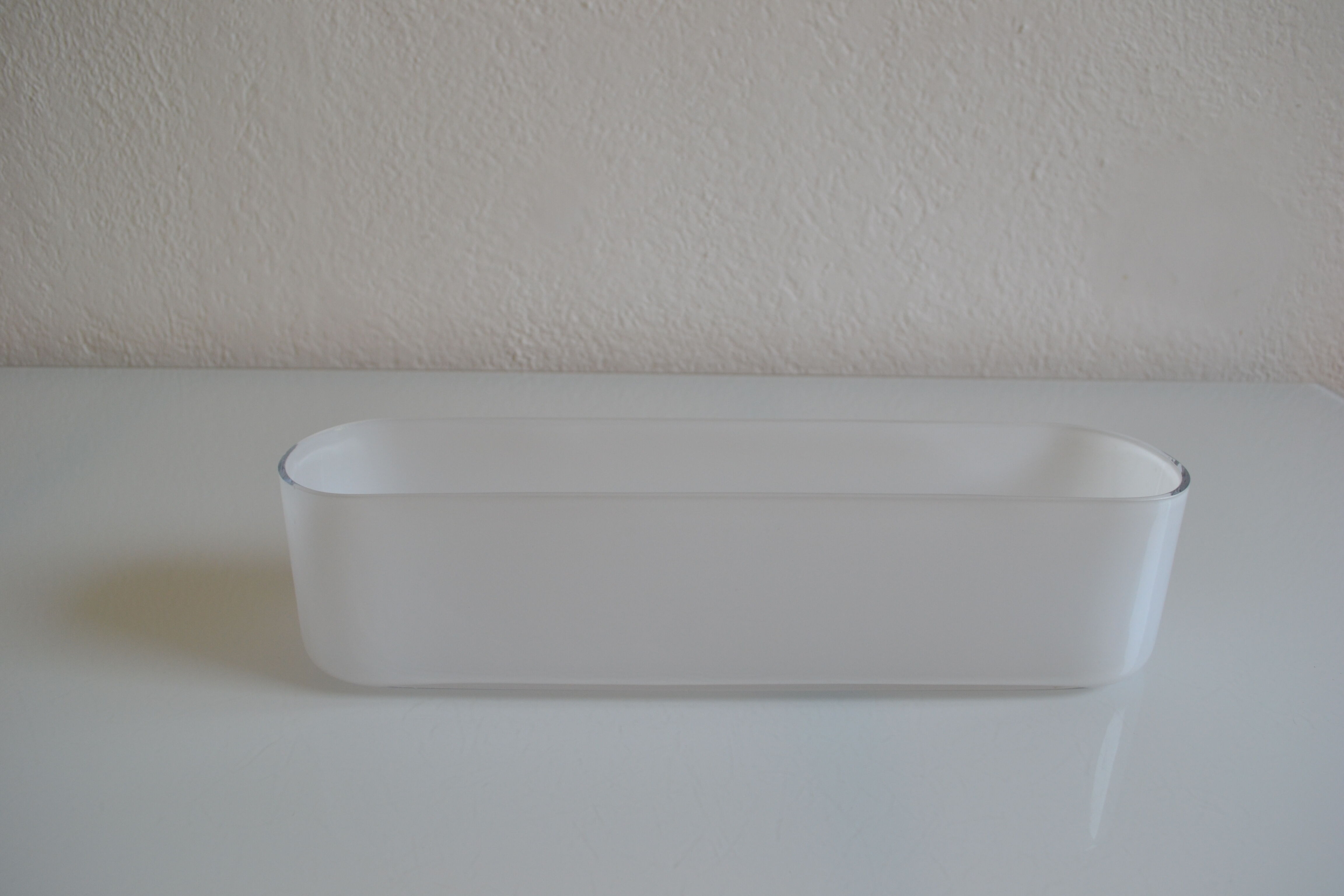 Modernist vase or centerpiece in white glass