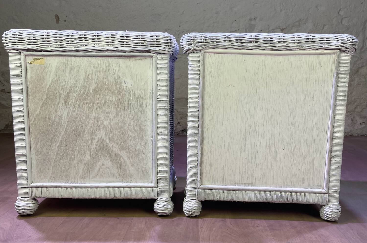 Pair of white lacquered rattan bedside tables