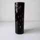 Black opaque glass vase with minimalist style copper inlays