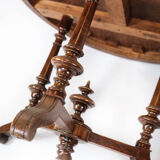 Round dining table of walnut with inlaid wood, 1890s