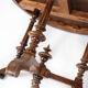 Round dining table of walnut with inlaid wood, 1890s