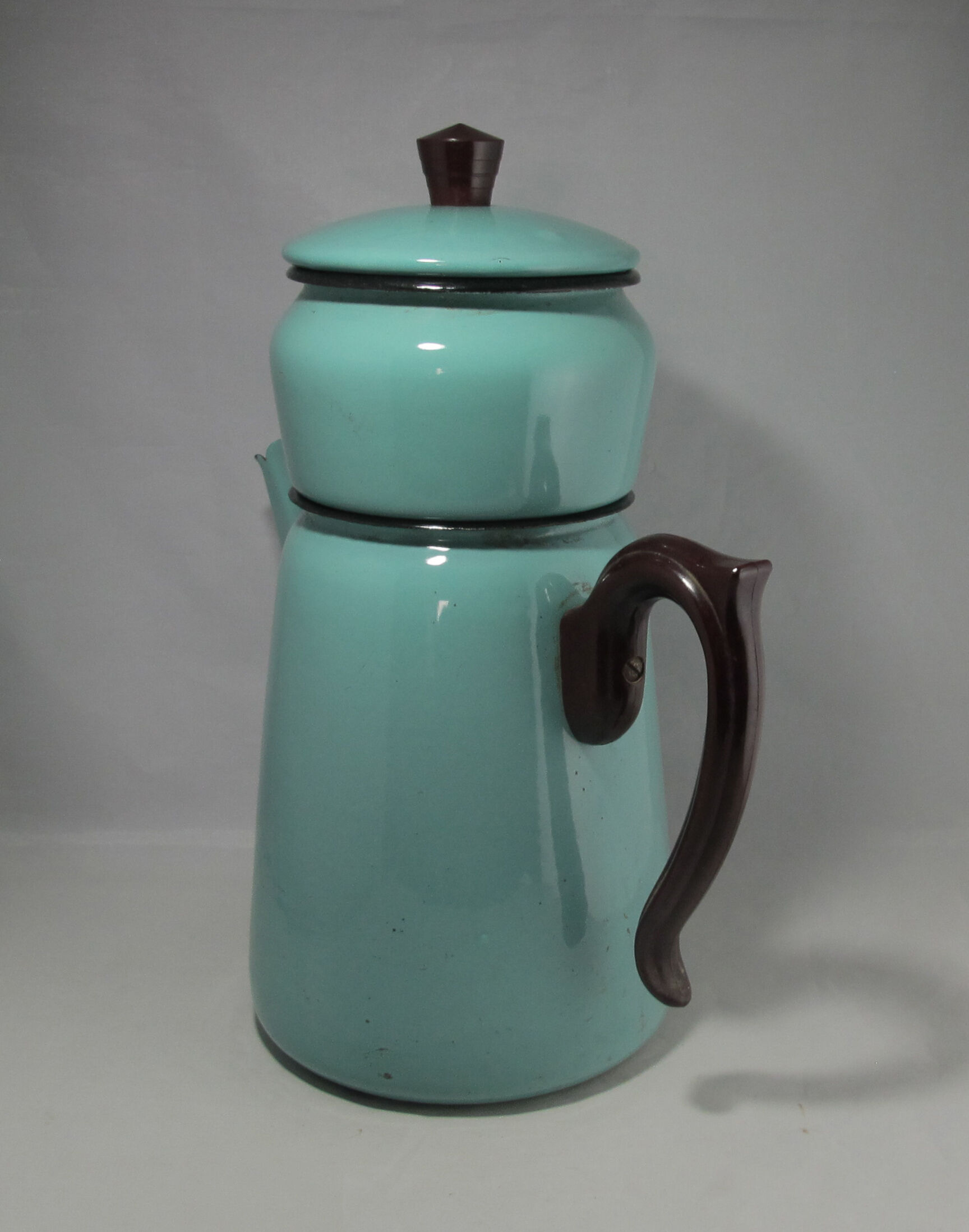 large vintage coffee maker made of enamelled sheet metal