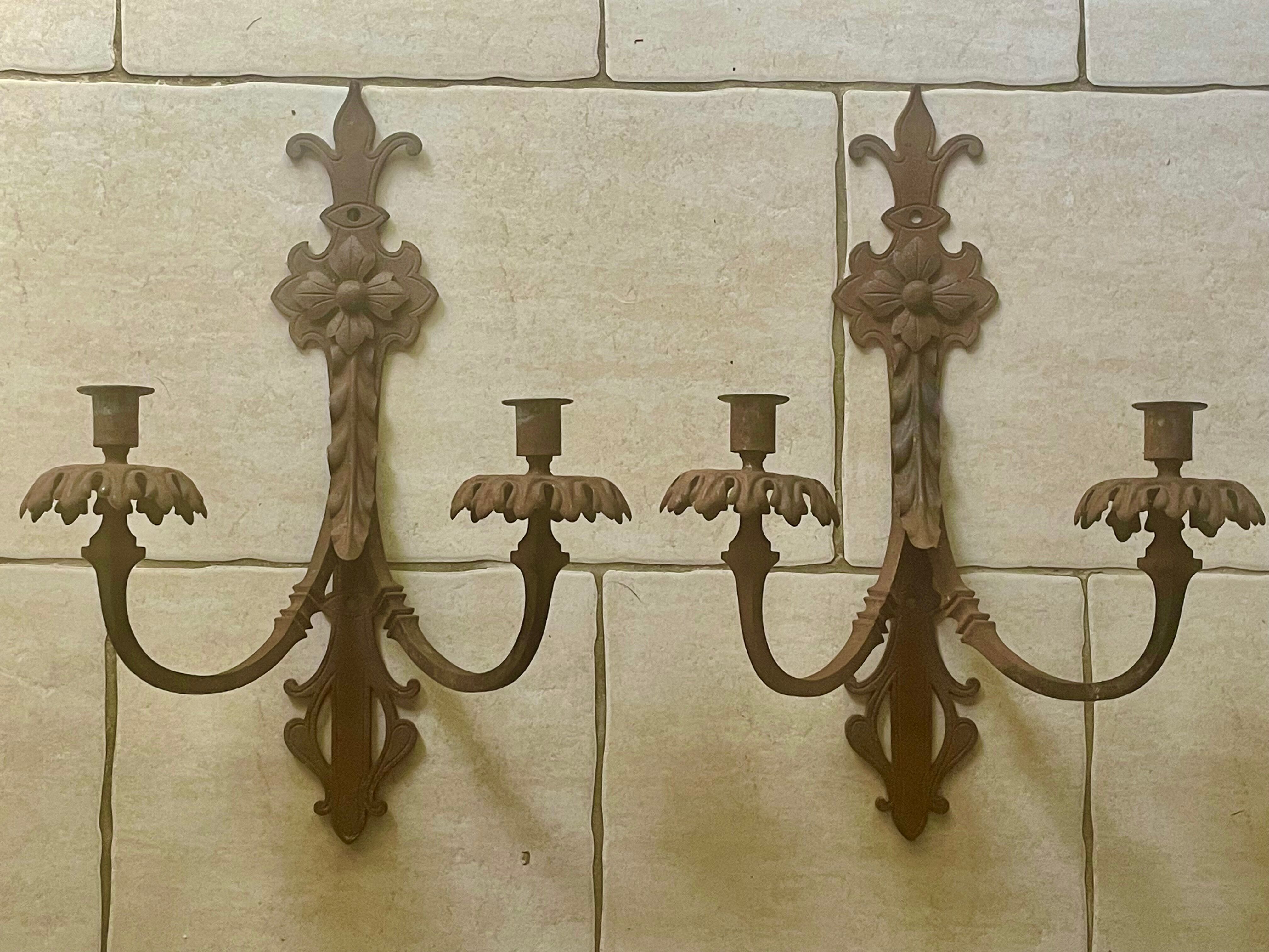 Large pair of non-electrified medieval style candle sconces rusty iron