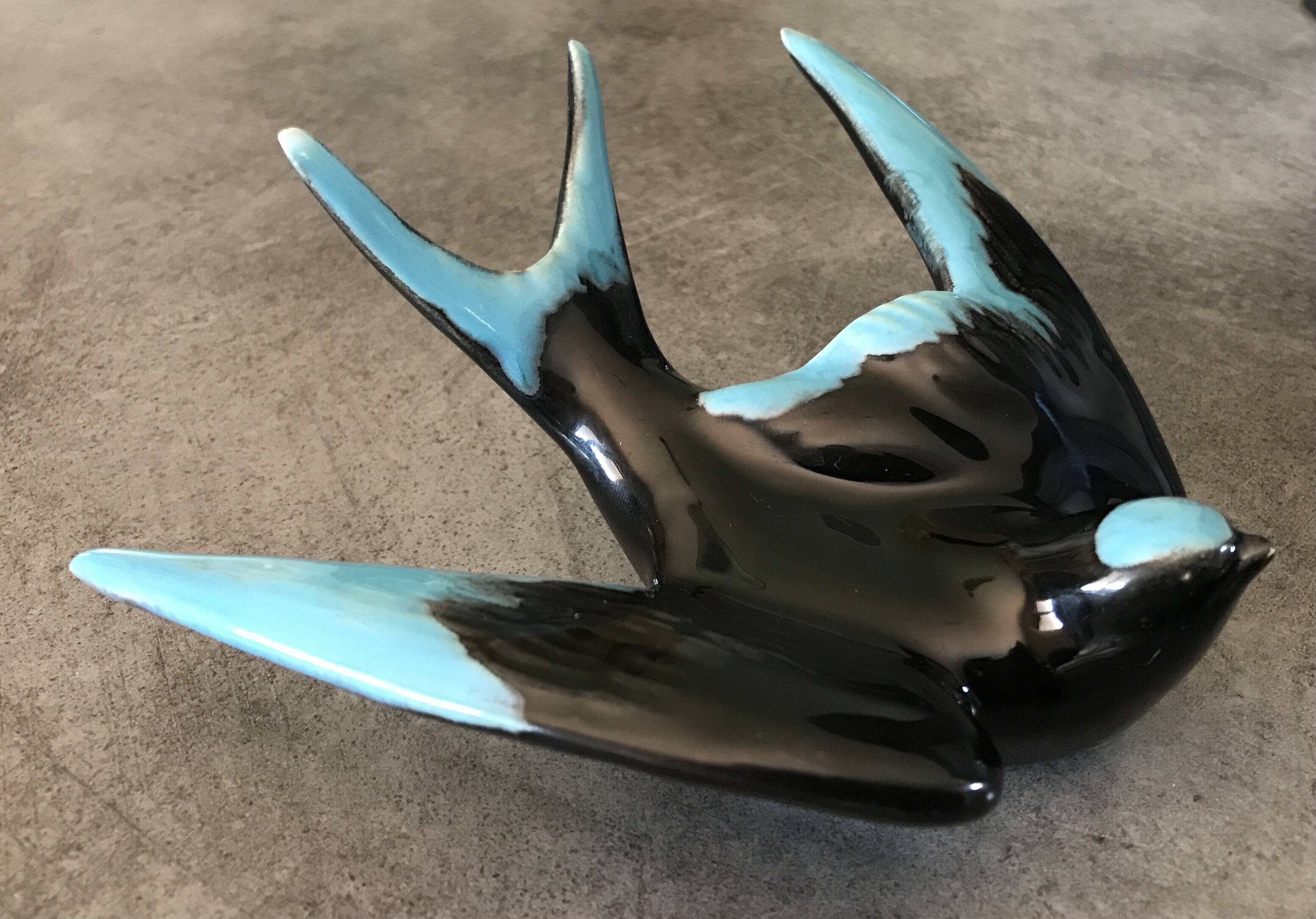Vintage swallow in two-tone black and blue enameled ceramic