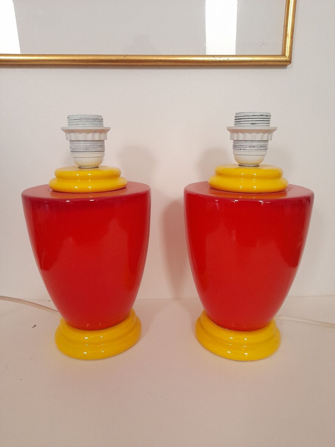 Pair of red and yellow lamp bases from the 80s