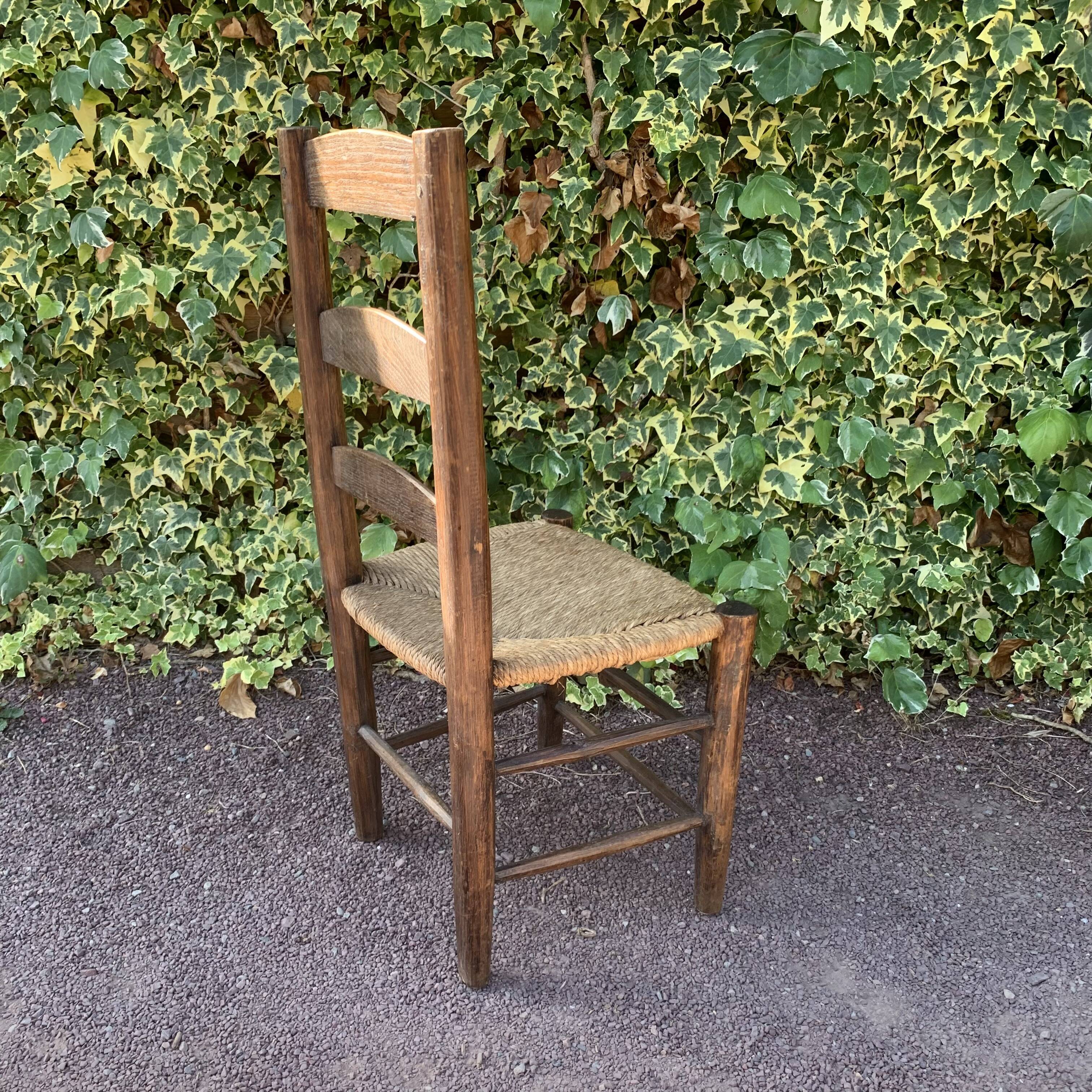 Set of 4 handcrafted rush chairs in solid oak.