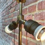 Old brass table lamp with claw feet