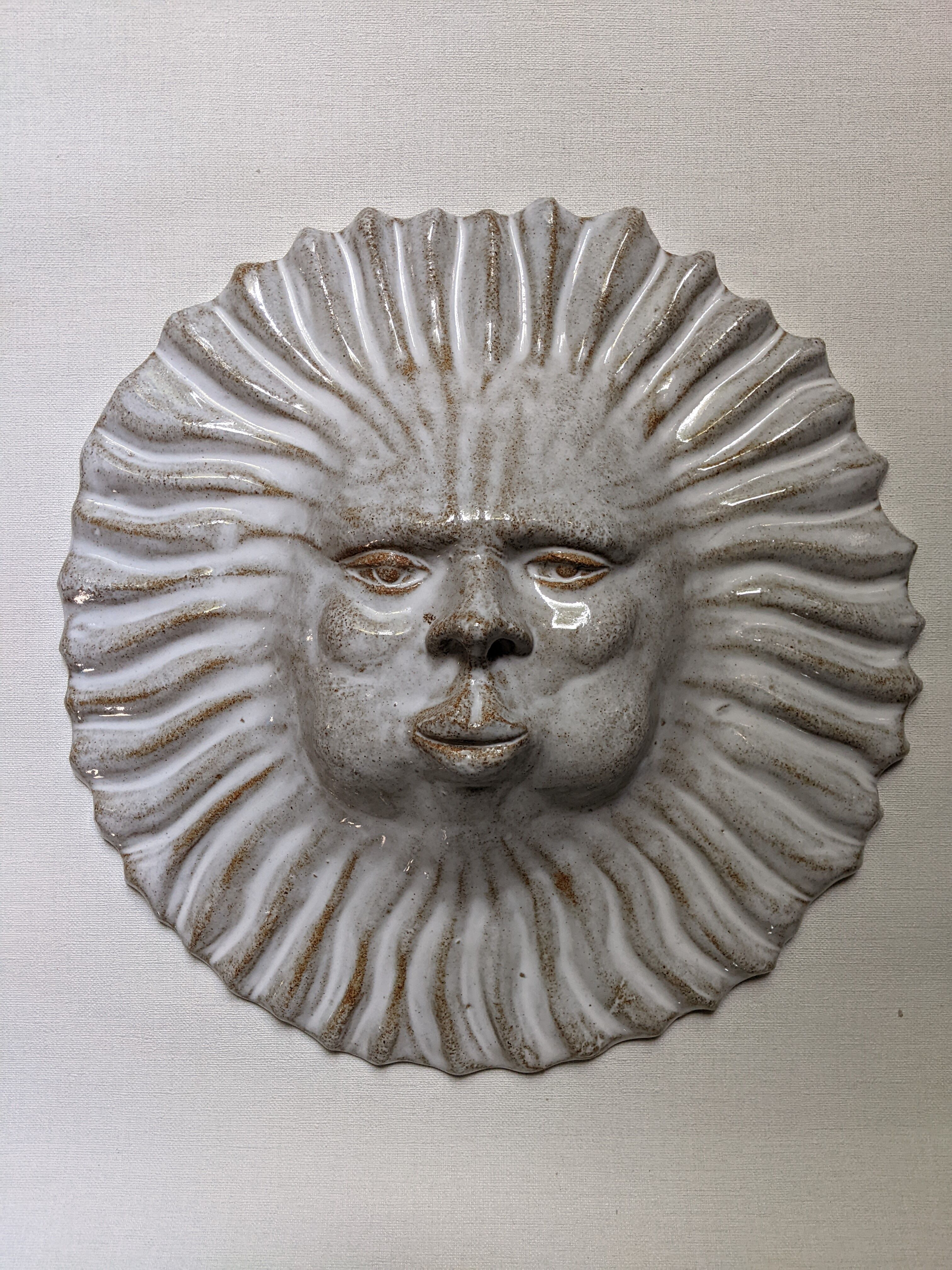 Handcrafted ceramic wall sun