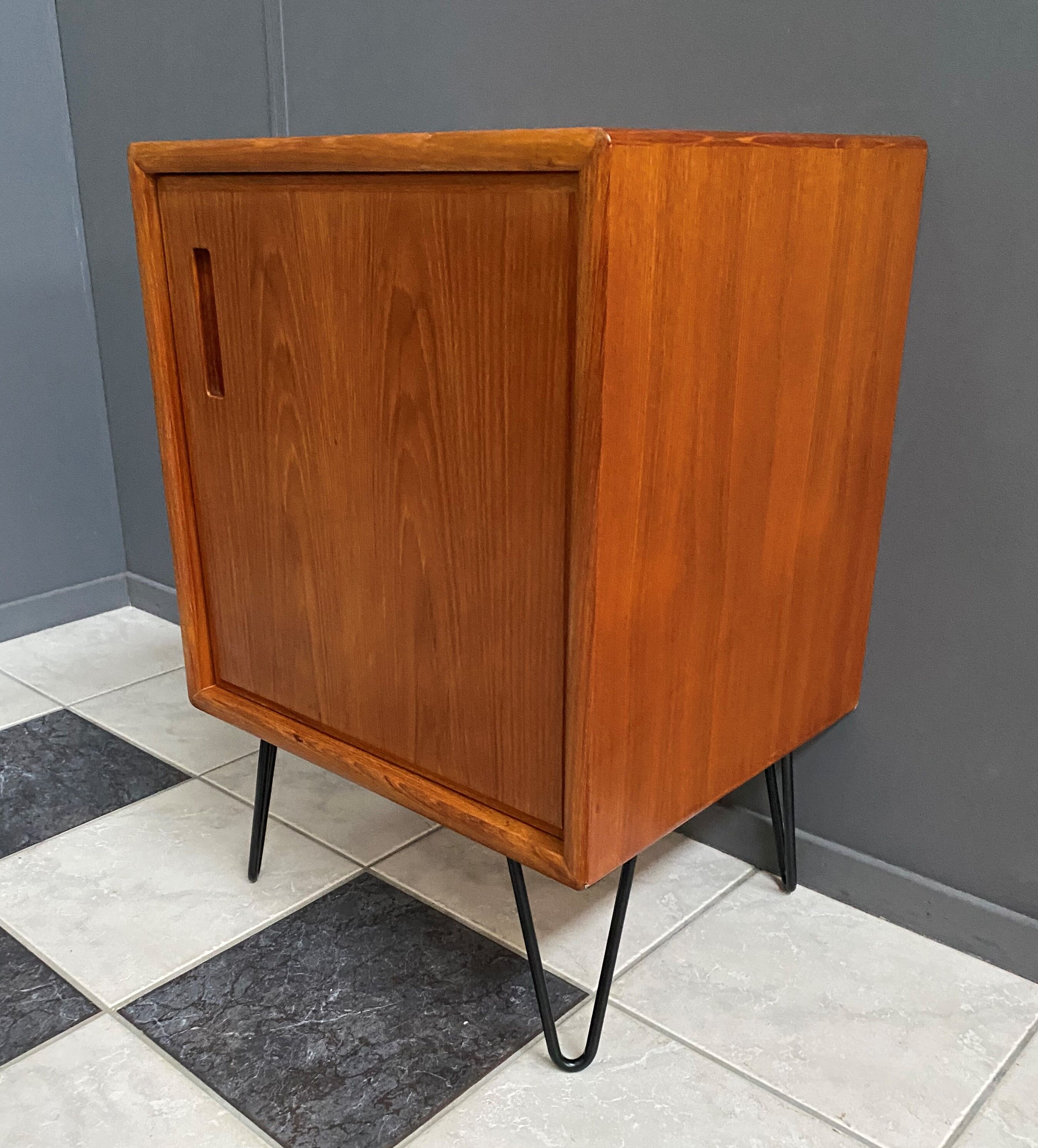 Danish teak cabinet 1960s on hairpin legs