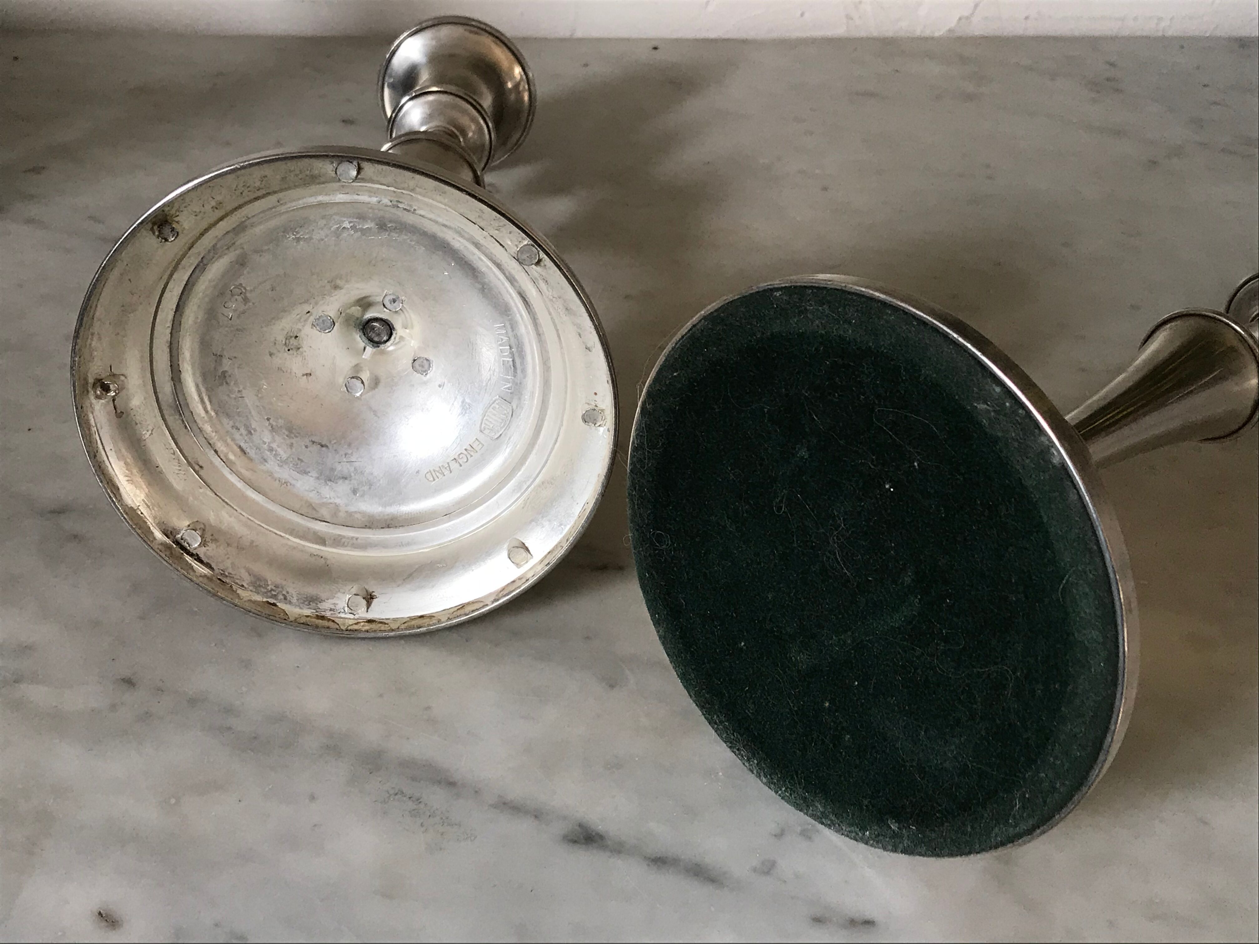 Pair of silver metal candlesticks
