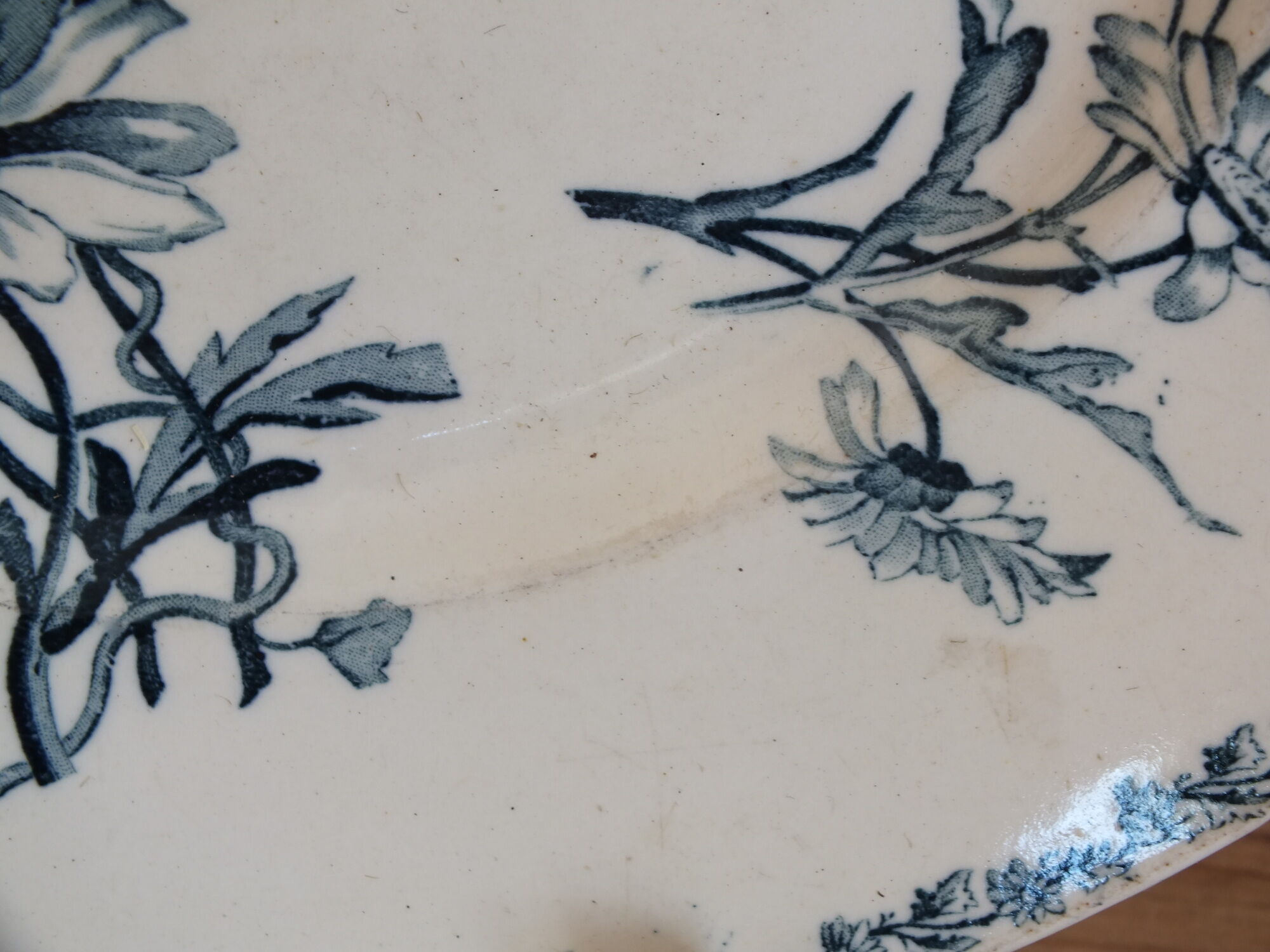 Old round dish in Terre de Fer Lunéville KG Marguerite